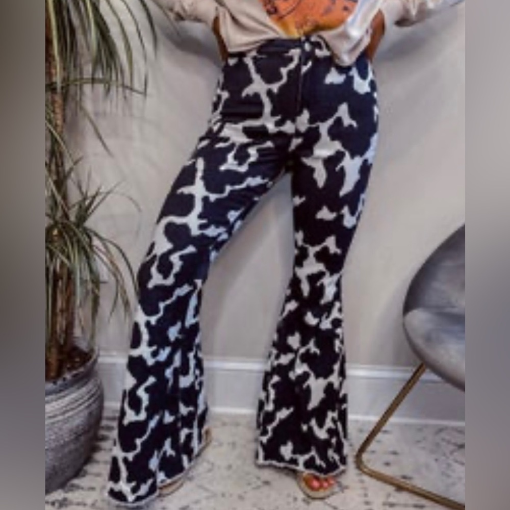 Cow print bell bottom jeans